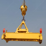 What is the maximum frequency of use for an adjustable spreader beam?
